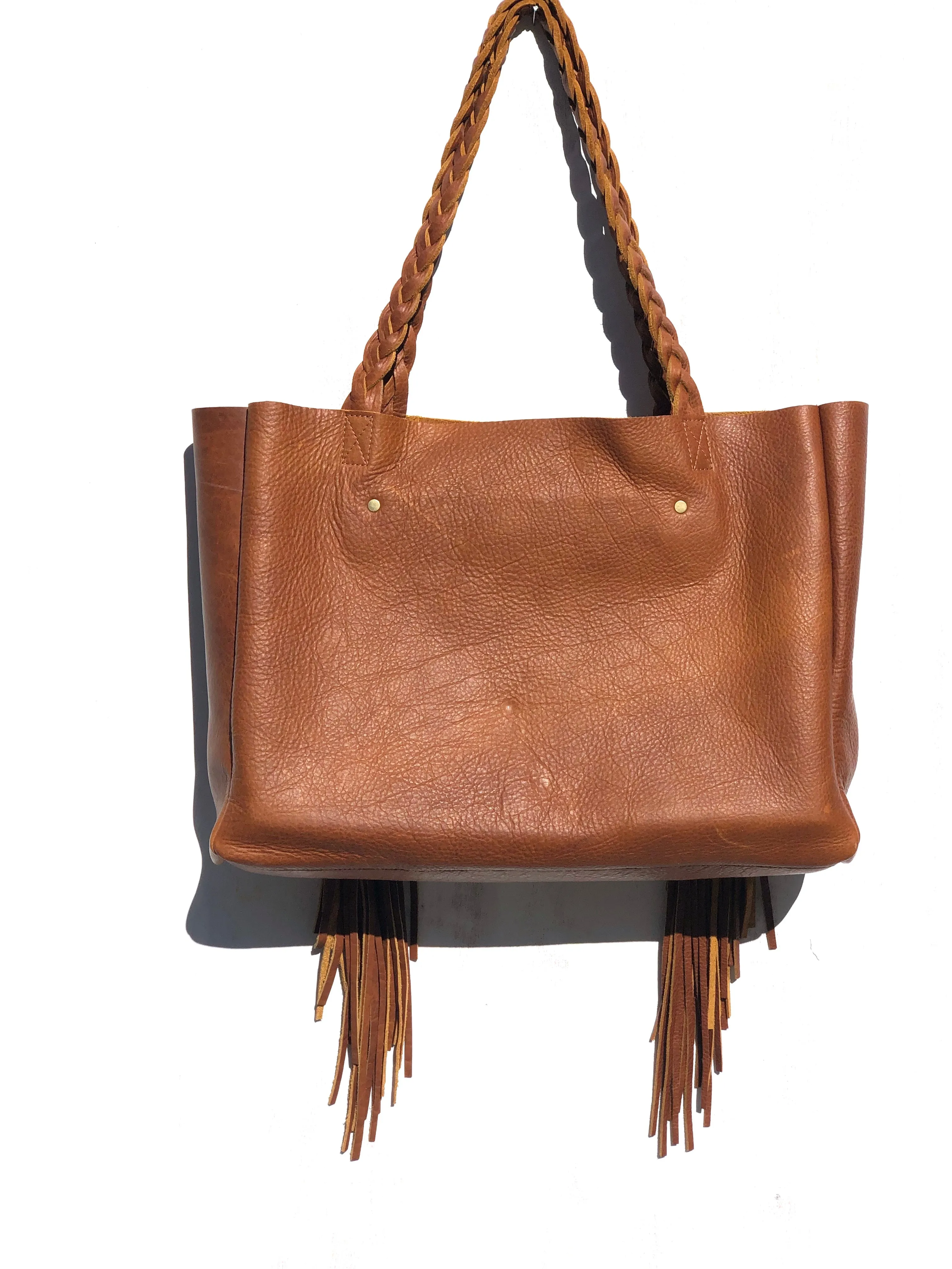 Cognac, boho chic braided leather bag