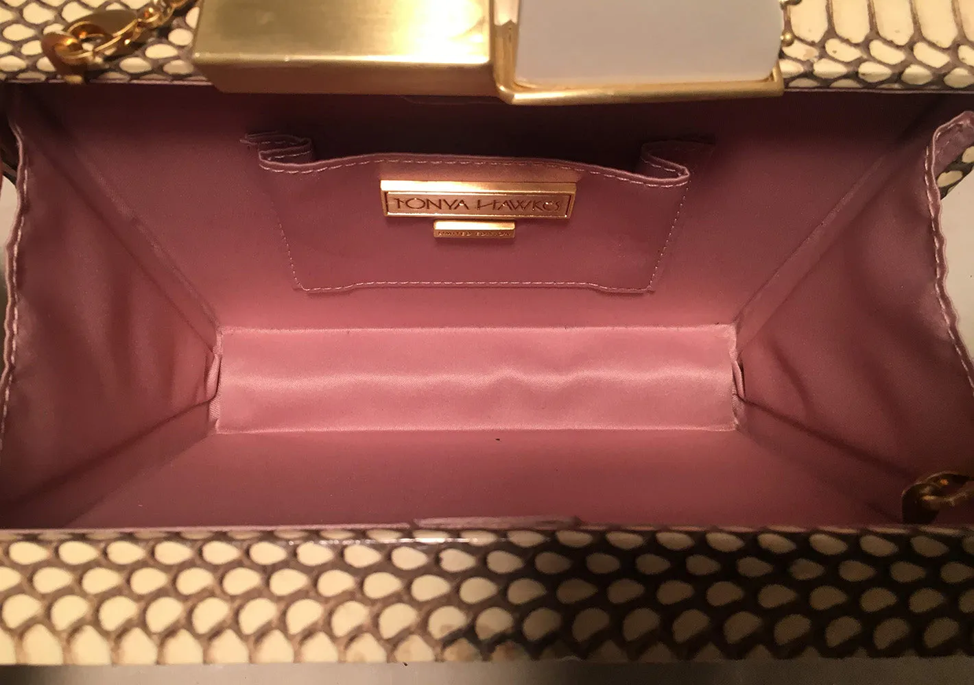 Tonya Hawkes Cream Embossed Patent Leather Clutch