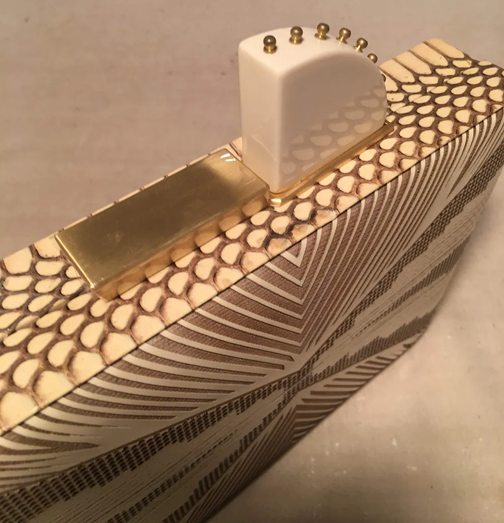 Tonya Hawkes Cream Embossed Patent Leather Clutch