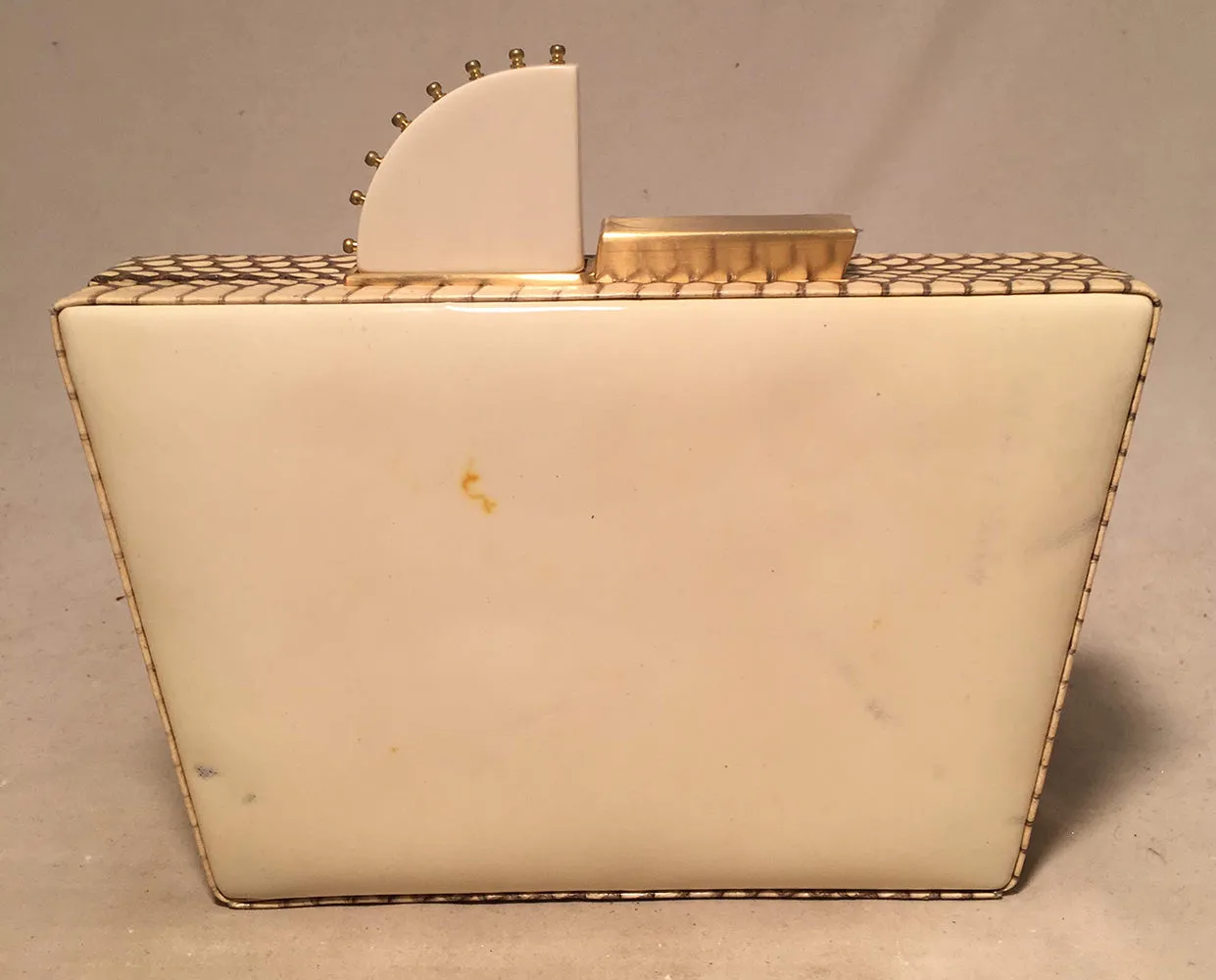 Tonya Hawkes Cream Embossed Patent Leather Clutch