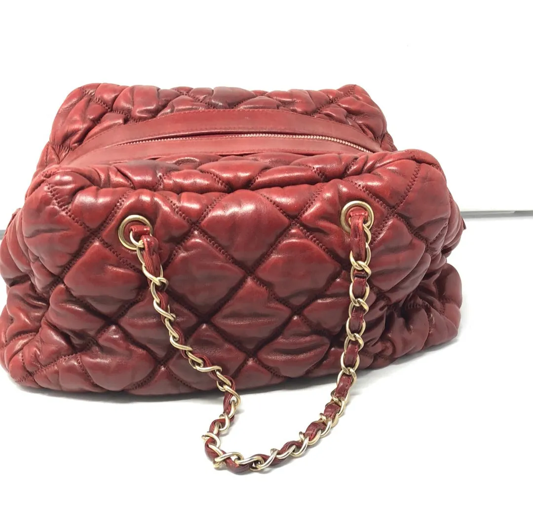 VINTAGE: Chanel Deep Red Leather Quilted double handle Bubble bag with gold textured CC
