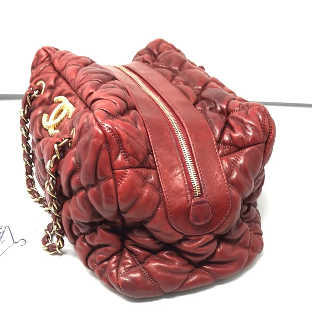 VINTAGE: Chanel Deep Red Leather Quilted double handle Bubble bag with gold textured CC
