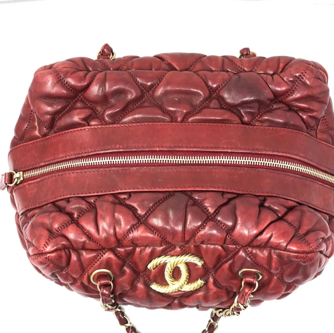VINTAGE: Chanel Deep Red Leather Quilted double handle Bubble bag with gold textured CC