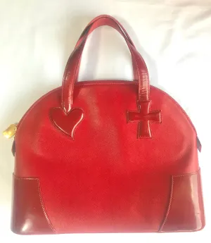Vintage Christian Lacroix red patent enamel and leather bolide bag with golden logo zipper charm. Comes with shoulder strap. 0403172