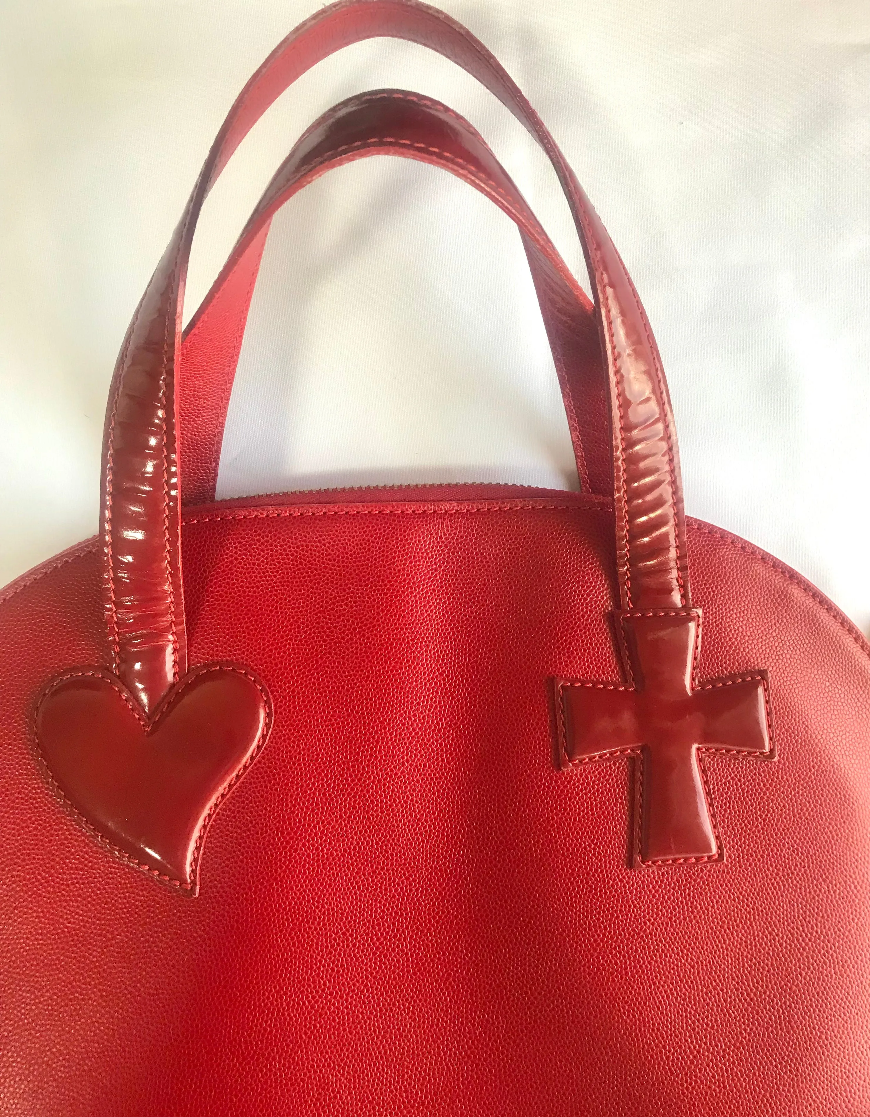 Vintage Christian Lacroix red patent enamel and leather bolide bag with golden logo zipper charm. Comes with shoulder strap. 0403172